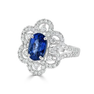 Oval shaped sapphire in a diamond flower designOval Shaped Sapphire Dress Ring