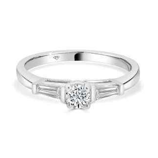 Trilogy Engagement Ring with Round and Baguette Cut Diamonds in 18kt White GoldRound diamond with baguette Triolgy Engagement ring