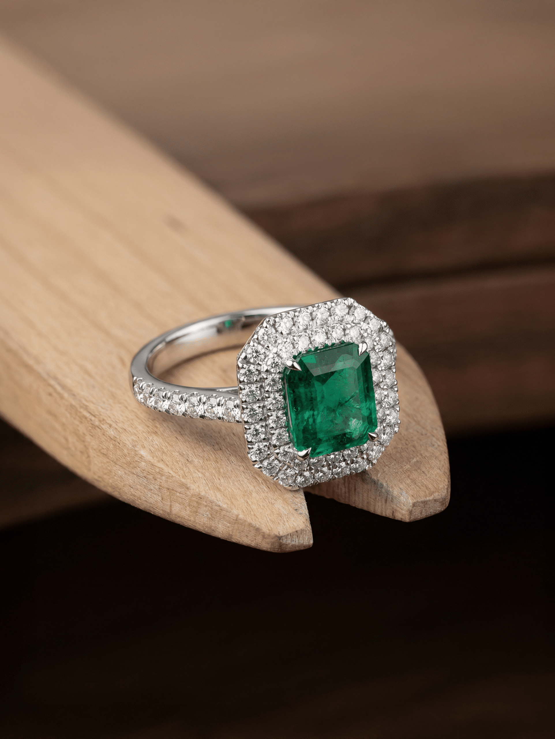 Oval Emerald with Claw-Set Round Diamond…