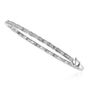 A sleek white gold diamond bangle crafted from 18 kt gold.
