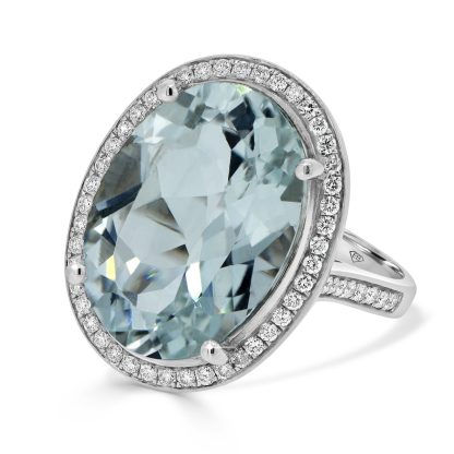 Aquamarine oval cut with diamond halo engagement ring