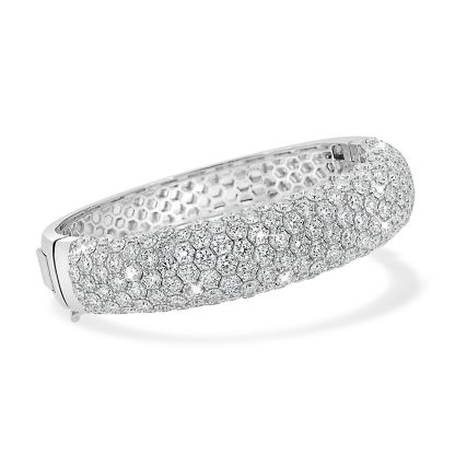 White gold diamond bangle featuring 160 diamonds totalling 17.63ct, crafted in an elegant honeycomb pave design with 18kt white gold.