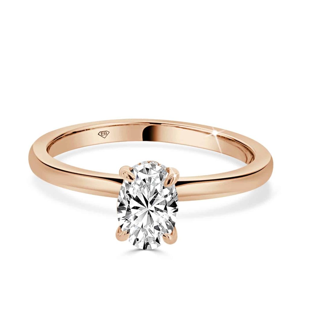Oval cut hidden halo engagement ring
