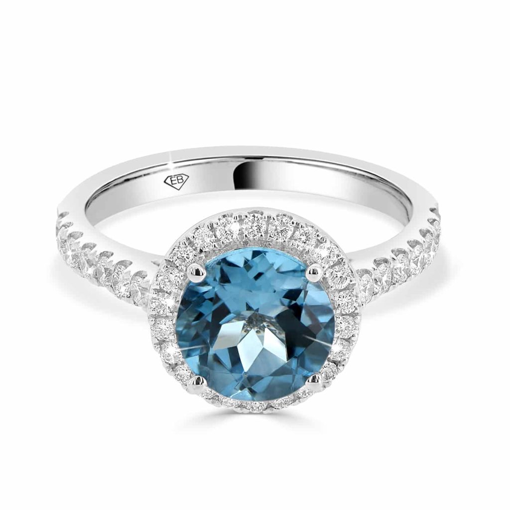 White gold blue topaz ring