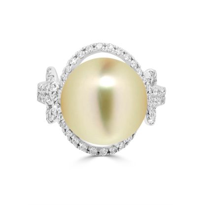 Golden pearl and diamond halo ring